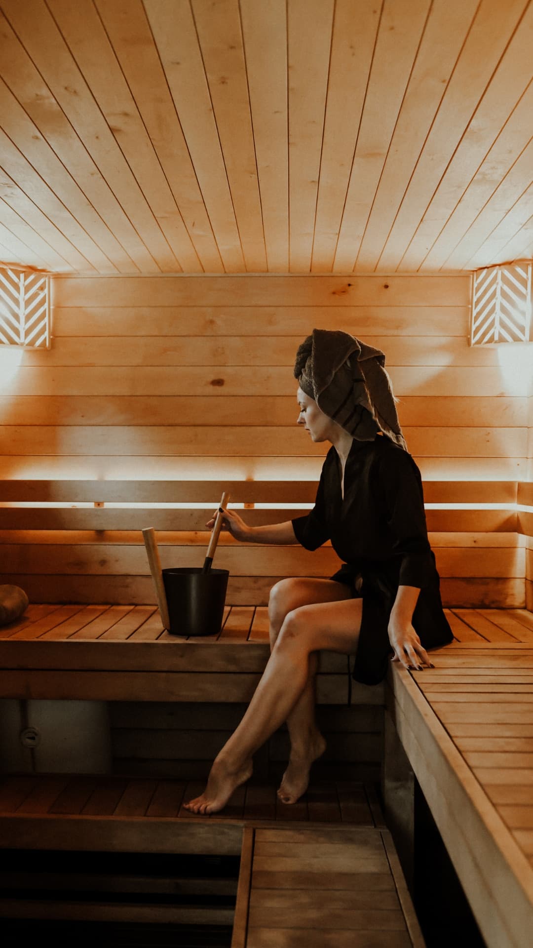 Guest relaxing inside sauna